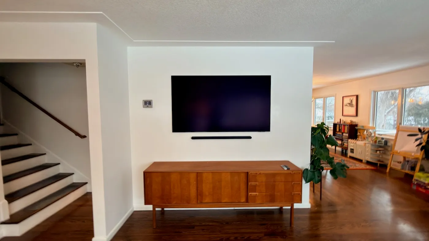 A level TV install in a living room with the cables tidied away