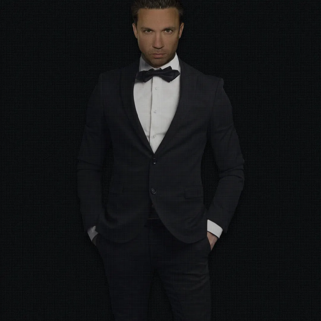 Marshall Wayne, founder of The Mounting Man, wearing a dark suit and bow tie