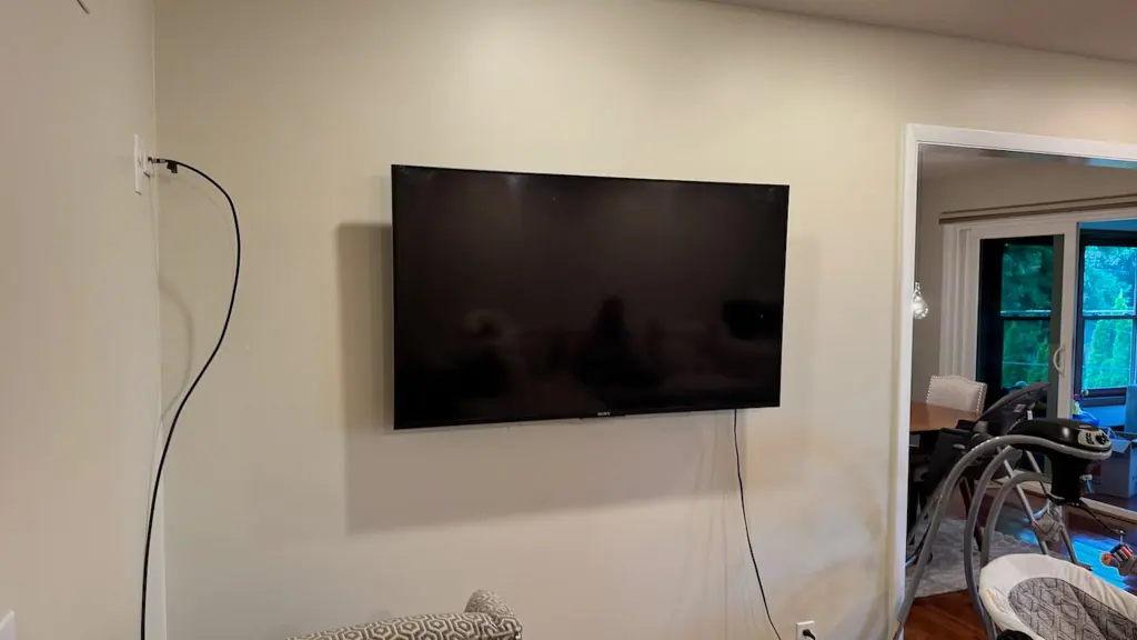 65 Inch Tv Mounted Edina Home Gym Area - The Mounting Man