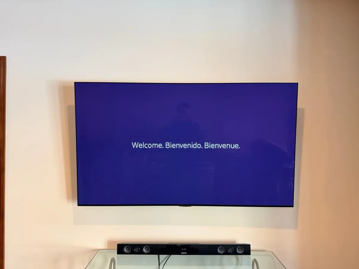 65-inch LG TV tilt mounted on drywall in Hopkins, Minnesota