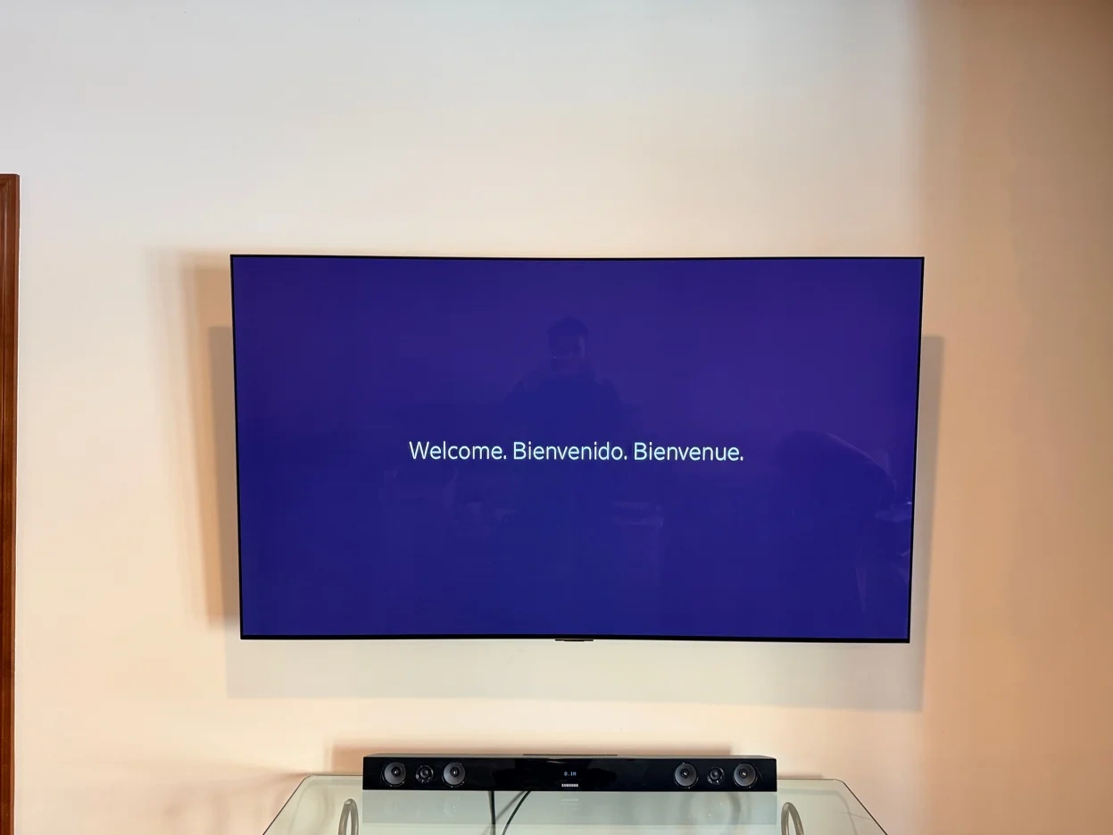 65-inch LG TV tilt mounted on drywall in Hopkins, Minnesota