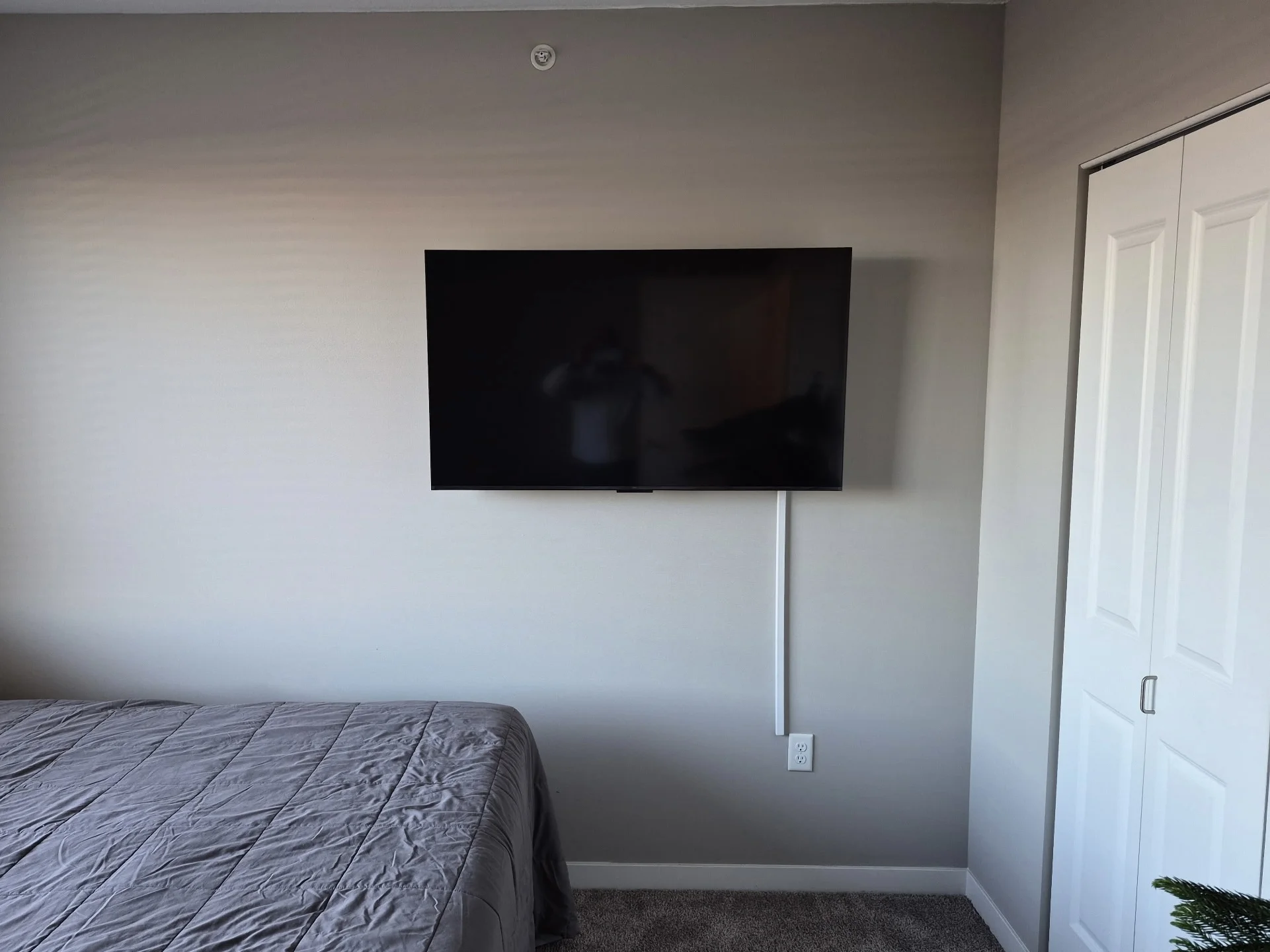 55" TV installation in Eagan Bedroom