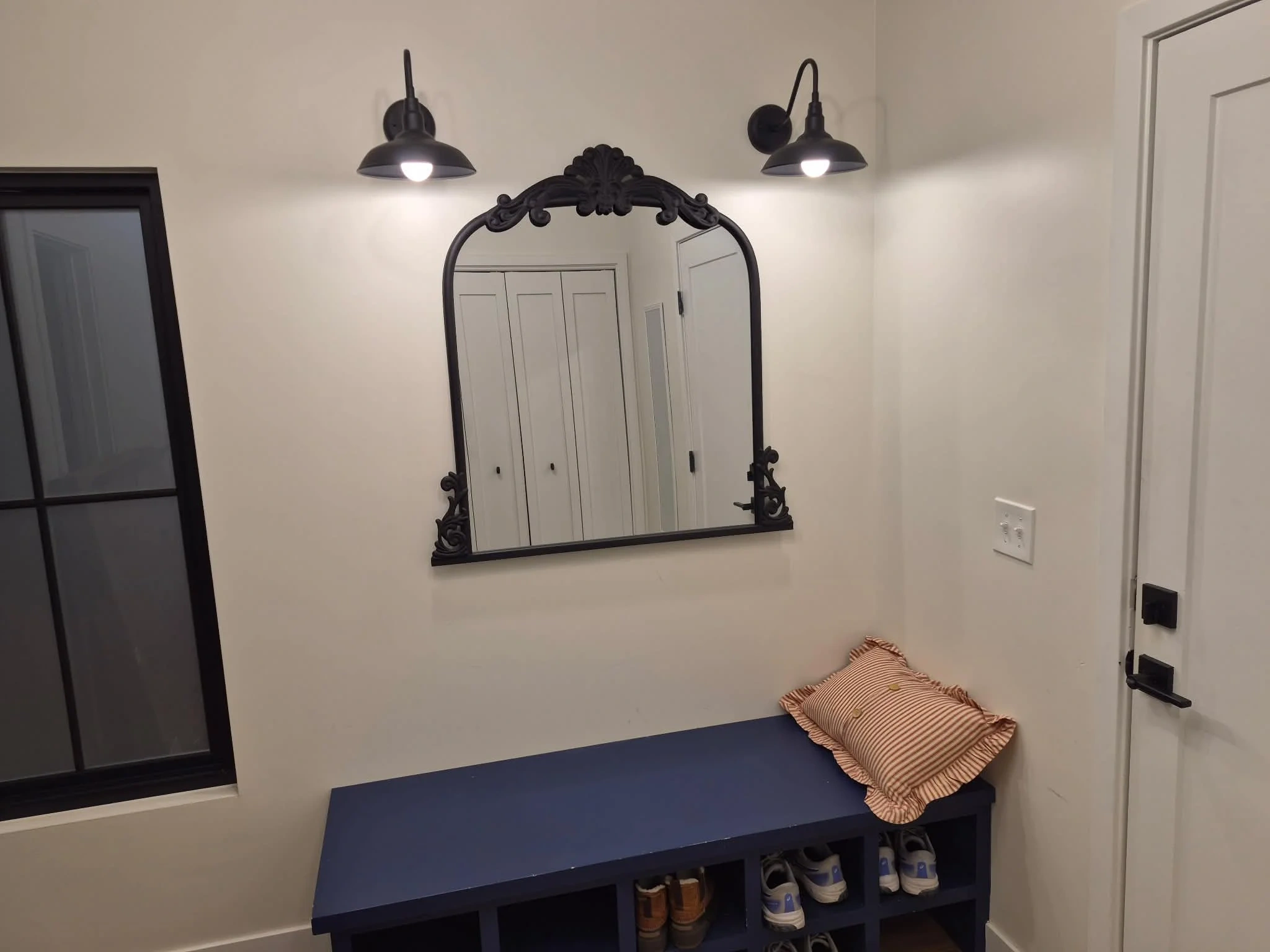 Ornate black arch mirror entryway Mendota Heights Douglas Road MN