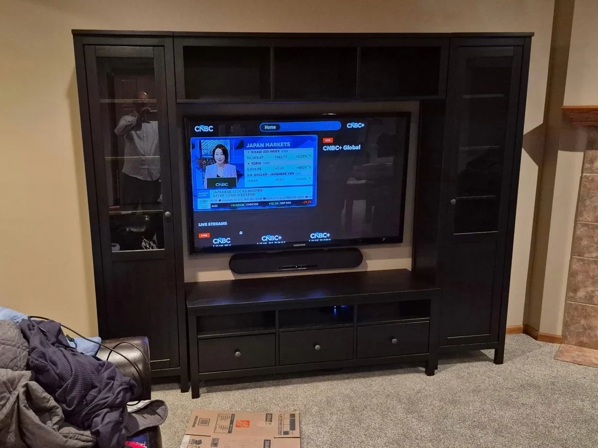 TV and soundbar installation in a Woodbury media cabinet