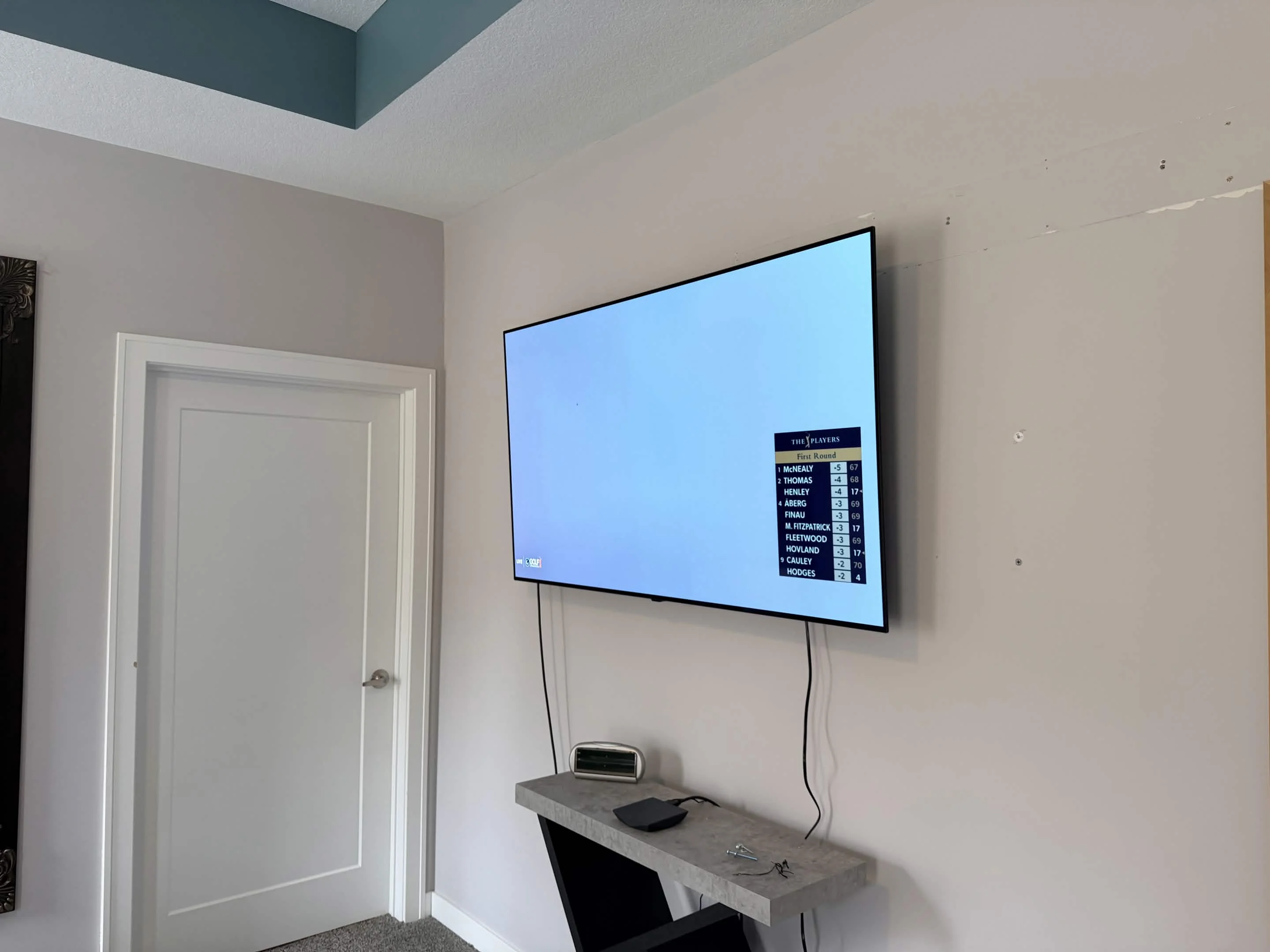 65-inch TV extended tilt mount in Chaska MN bedroom